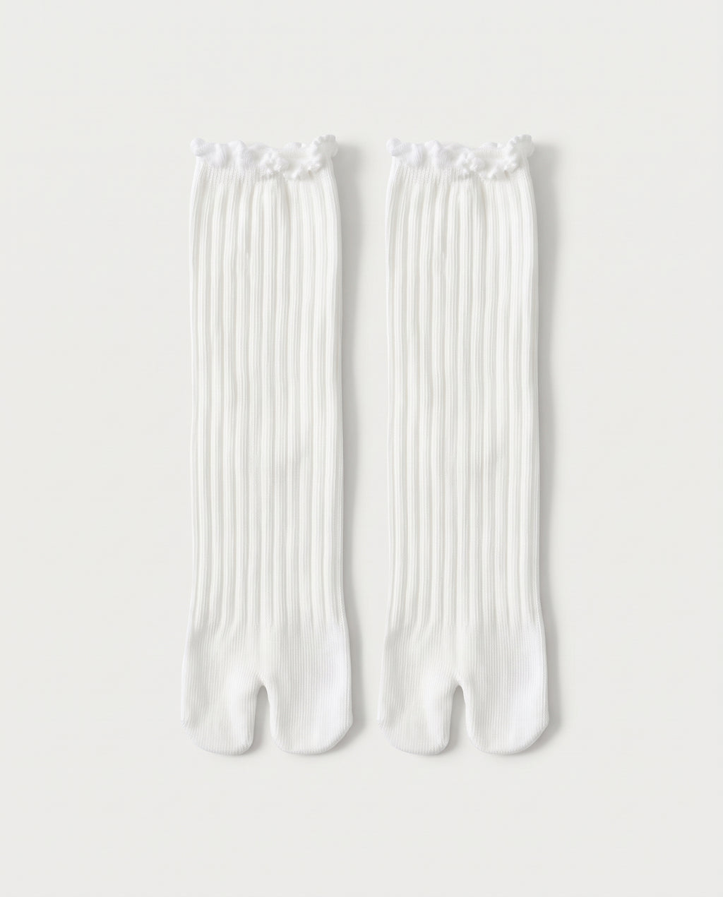 Chaussettes mi-longues fendues blanches