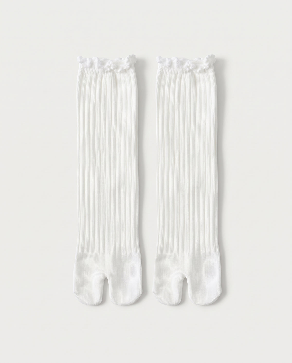 Chaussettes mi-longues fendues blanches