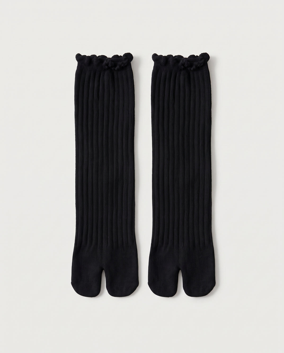 Chaussettes mi-longues fendues noires